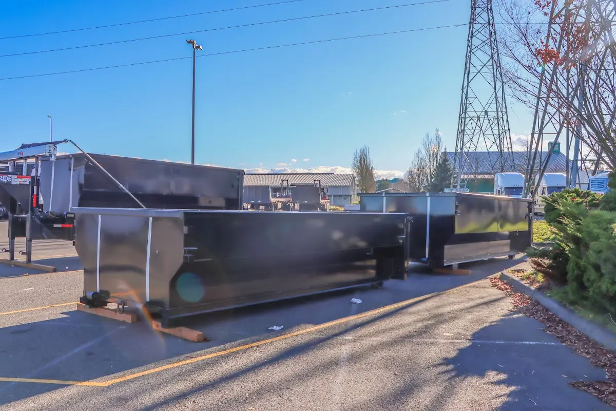 Roll-off dumpster ready for waste disposal at job site for 2 Yard Dumpster Rental in Haverford